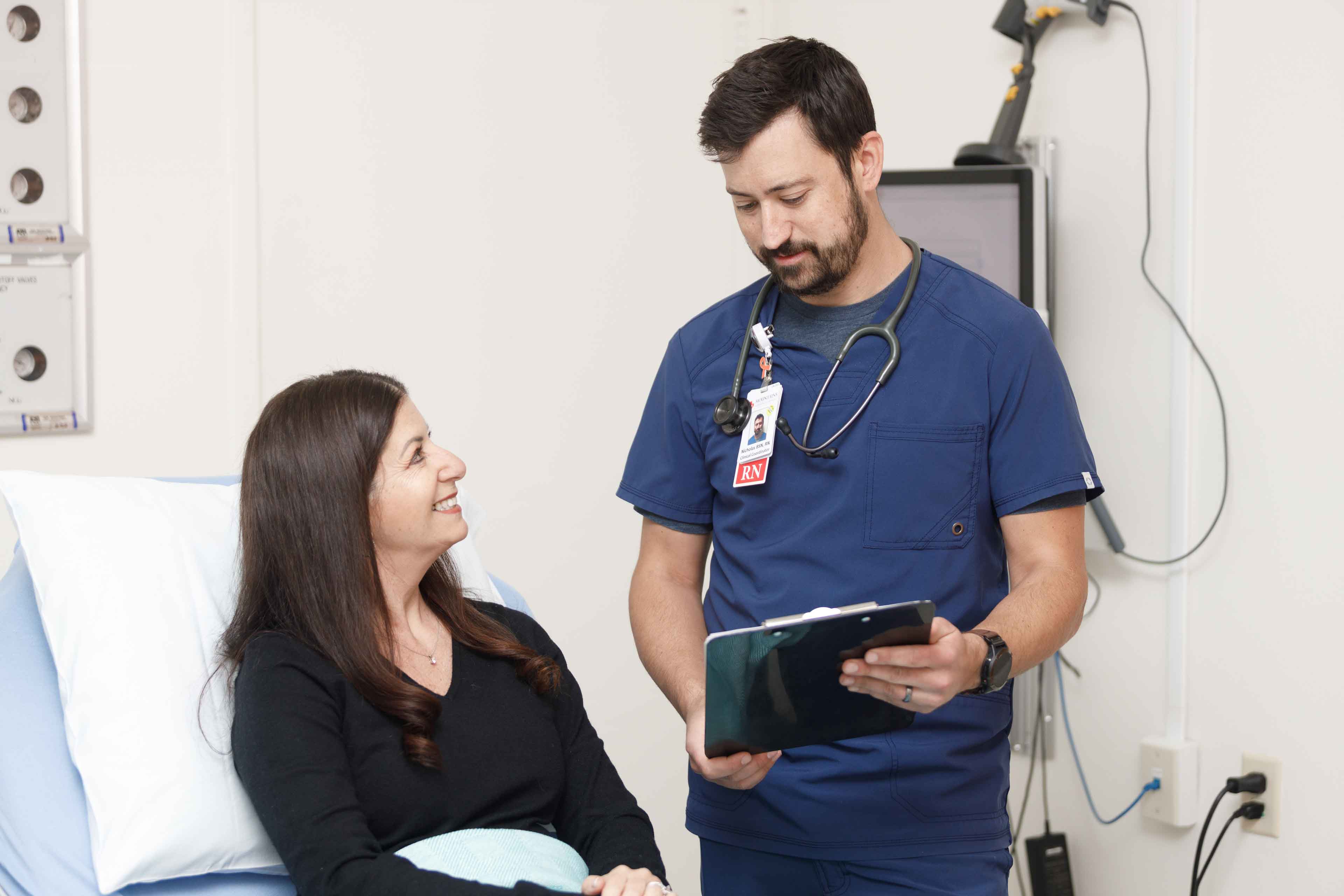 Doctor tending a patient at mountains community health
