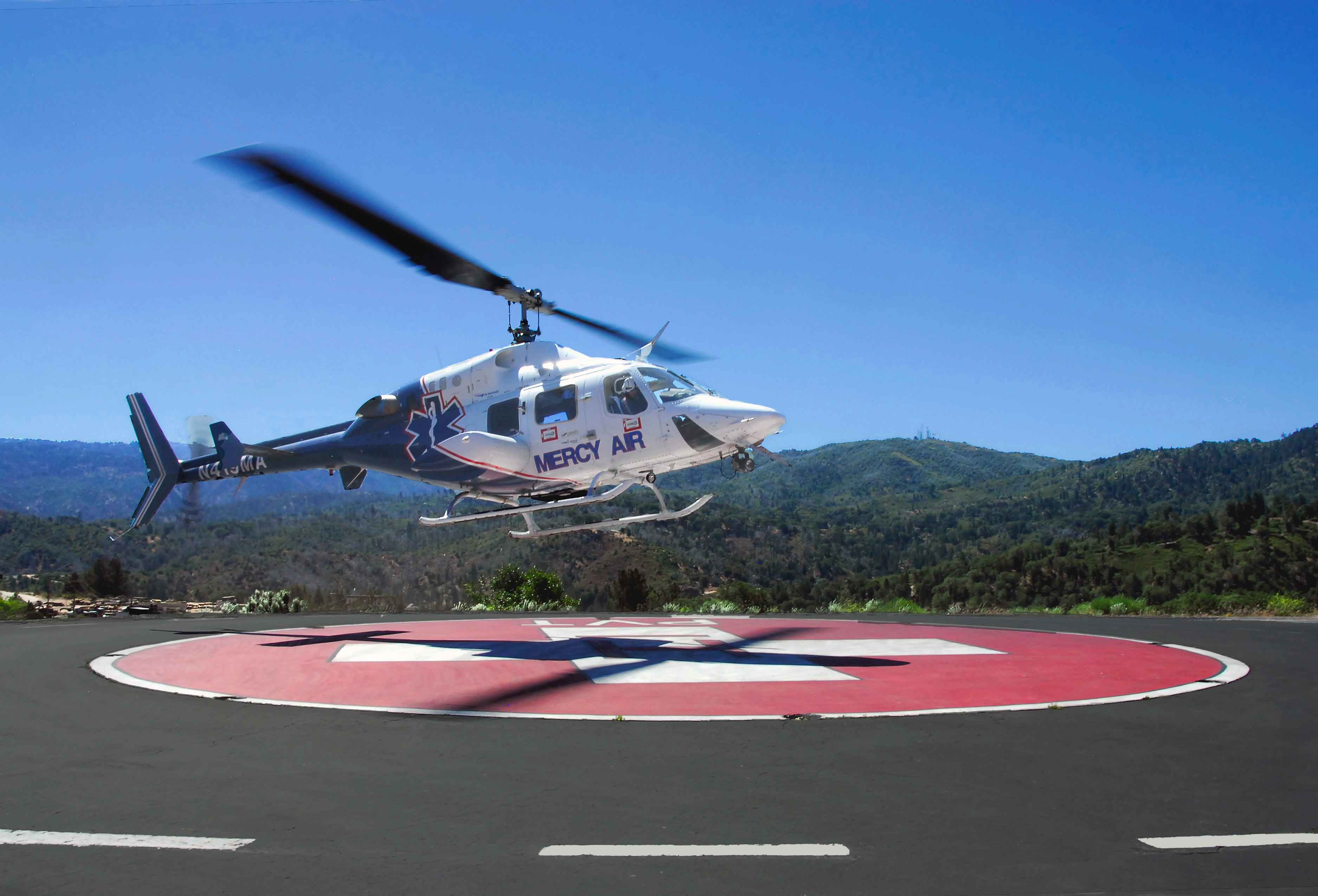 Helicopter landing at the mountains community health helipad