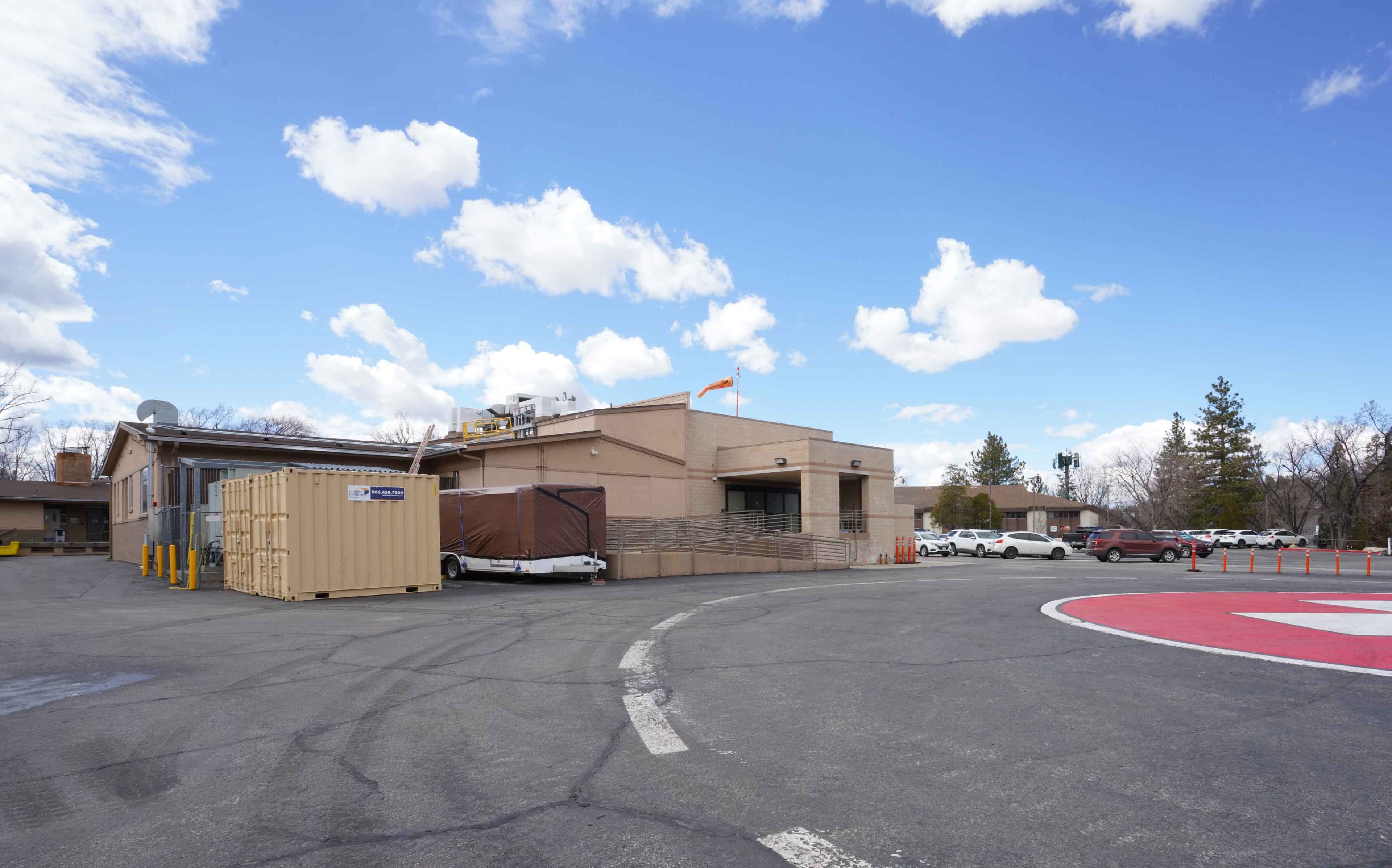 South east corner facing surgery er departments with helipad in view